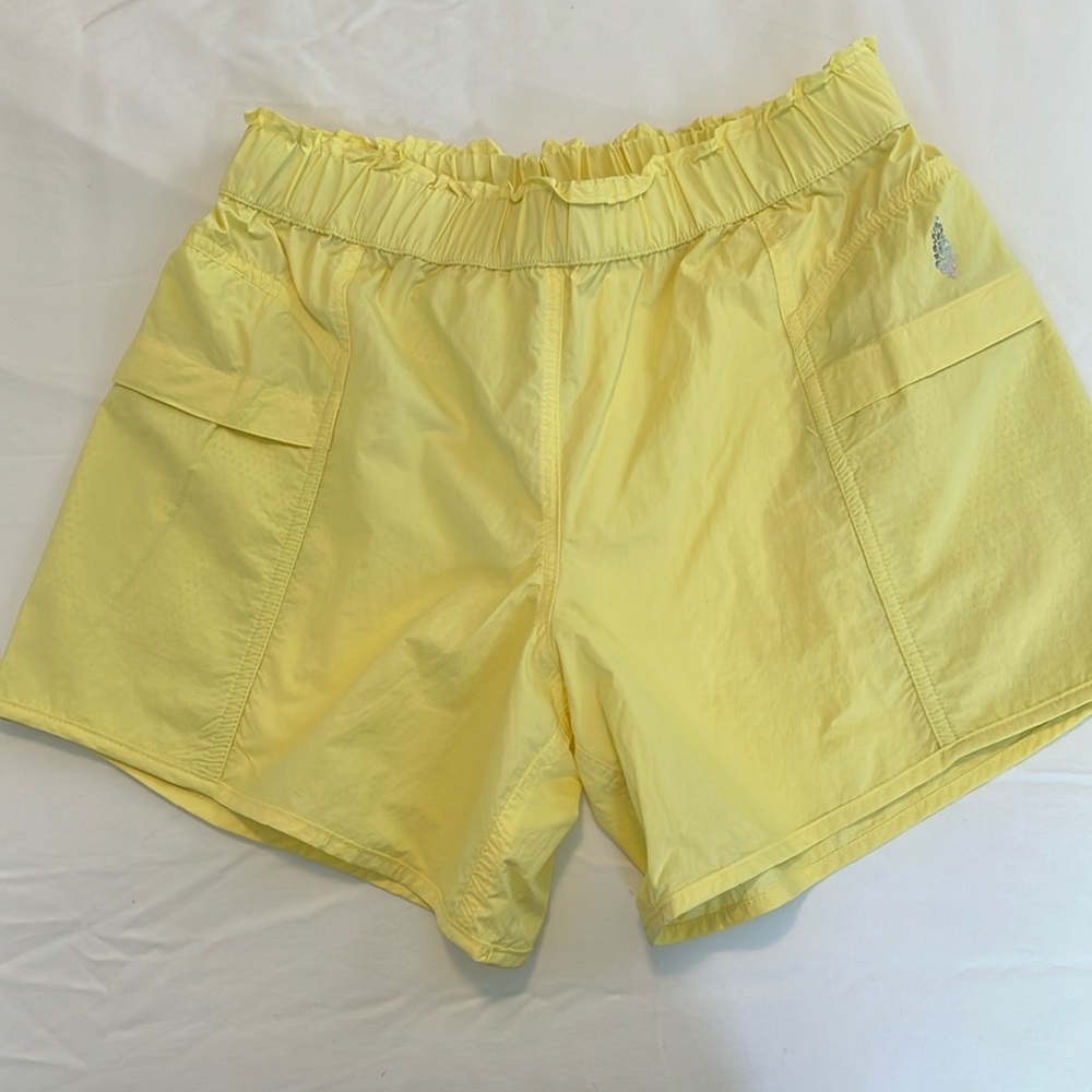 Free people movement yellow shorts